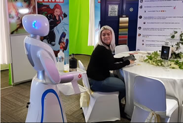 robot waiter serving drinks